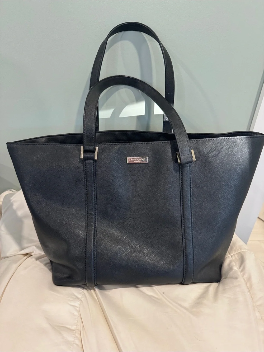 kate spade black leather tote with gold plaque